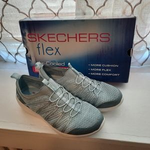 Sneakers by Skechers